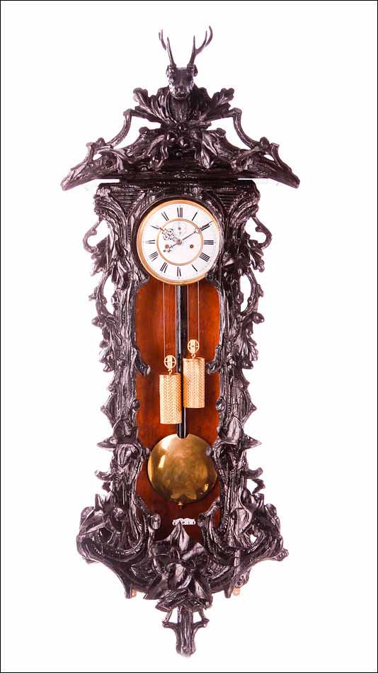 Reloj de pared antiguo con péndulo, tipo Viena y selva negra
